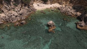 Beautiful coastline of Greece coast from drone. Aerial video view from drone on sea and coastal rocks in Mediterranean sea