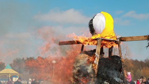 4K Belarus Burning Effigies Straw Maslenitsa In Fire Flame On Traditional National Holiday Dedicated To Approach Of Spring - Slavic Celebration Shrovetide.
