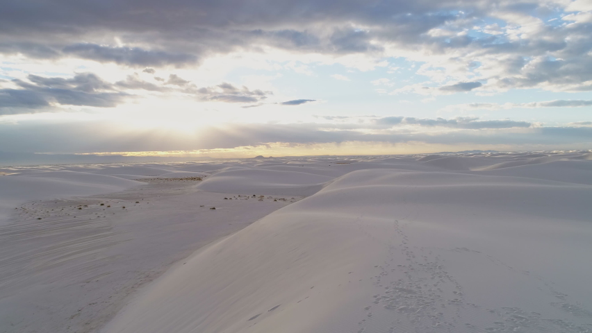 4k aerial of White Sands National Monument New Mexico at sunrise with hikers