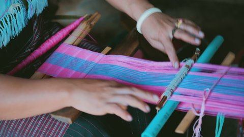 Traditional Karen Weaving Thread to produce handcrafted scarfs souvenir in Chiang Mai, Thailand
