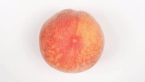 Peach close-up. Top view. Loop motion. Rotation 360. 4K UHD video footage 3840X2160.