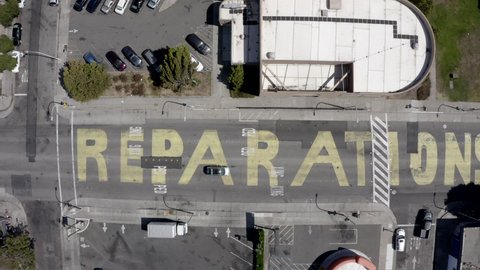 Richmond, California, USA - July 22, 2021: Aerial view of a "Reparations Now" mural in downtown Richmond.