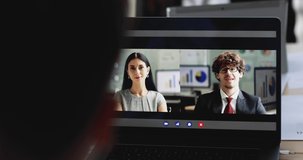 Online job and duty assignment idea, a male audience watching laptop computer screen and listen to businessman and businesswoman executive speaking and show pose that agreed and accepted idea.