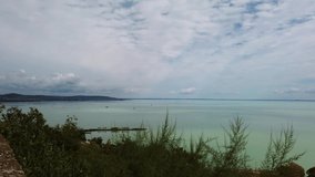 Impressive timelapse video from Hungary, Tihany peninsula, turning from the northern to southern part of Lake Balaton on a cloudy and windy day.