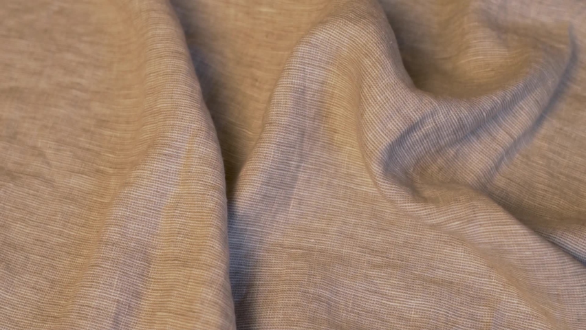 Light Texture Of Natural Linen Fabric Of Clothing, Plaid Linen, Bedspreads, Linen Material Textiles, Macro. The Background of Linen Fabric. Royalty-Free Stock Footage #1079530202
