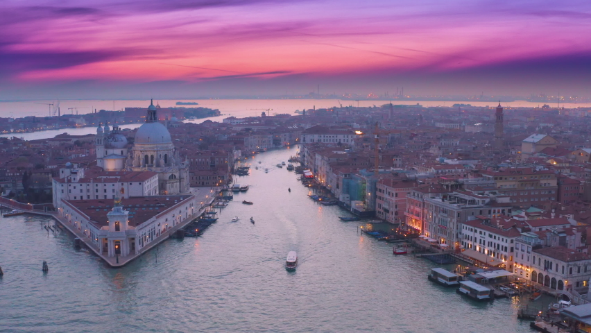 Venice italy skyline aerial view at sunrise colored sky. Venice grand canal cathedral church in old town birds view. Venedig ships italy city. Royalty-Free Stock Footage #1079541446