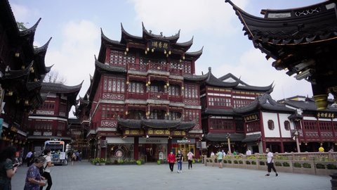 Shanghai, China - Sep 7, 2021: Chenghuang Temple and Yu garden in Shanghai China with full of tourists. Tourism, travel and city concept b-roll footage of Shanghai China