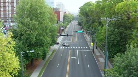 Nashville , TN , United States - 08 10 2021: Vanderbilt University pedestrian walkway over street. Aerial reveal shot.