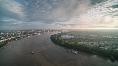 Establishing Aerial View Shot of Bordeaux Fr, world capital of wine, Nouvelle-Aquitaine, France, River Garonne, foggy