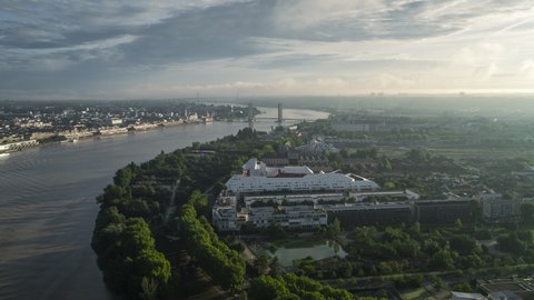 Establishing Aerial View Shot of Bordeaux Fr, world capital of wine, Nouvelle-Aquitaine, France, River Garonne, soft light