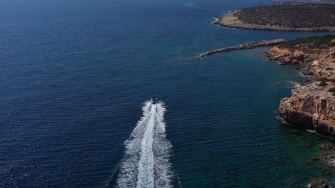 Inflatable Boat In Paros Island Of Greece. View from above with drone