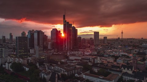 Stormy Sunset, revealing crane shot, Establishing Aerial View Shot of Frankfurt am Main De, financial capital of Europe, Hesse, Germany
