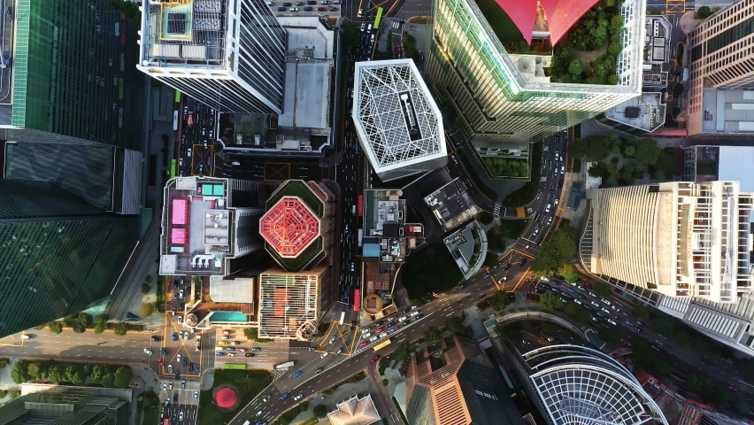 Skyscraper tower building, car traffic transportation in financial business district at Singapore city, drone aerial cityscape top view. City life, public transport, commuter lifestyle concept Royalty-Free Stock Footage #1079598812