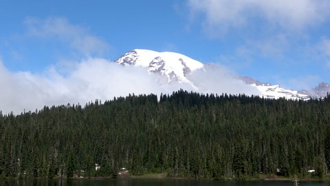 The summit of Mount Rainier with surrounding landscape