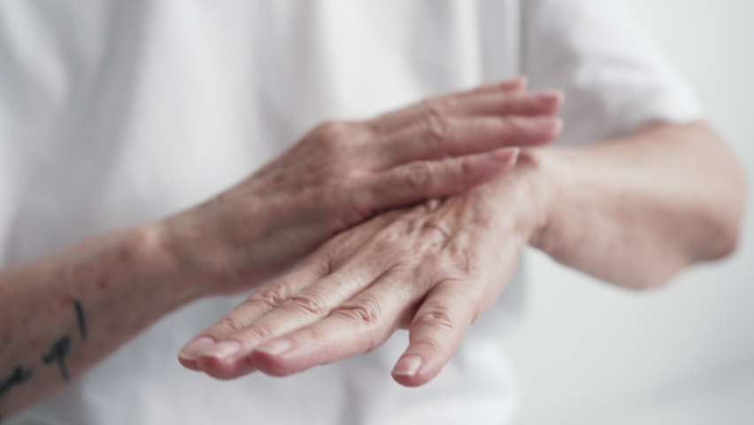 Aged Woman Hands Care Cream Close-up. Concept Anti-Aging Nature Cosmetics. Elderly Adult Lady Apply Cream on Skin and Massage Arm for Softness. Daily Moisturising Hydration Vitamin Mature Age Creme Royalty-Free Stock Footage #1079631788