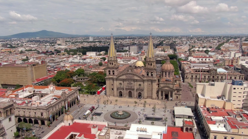 Guadalajara Cathedral And City Hall - Exterior View Of Cathedral of the Assumption of Our Lady In Metropolis Of Jalisco In Mexico. - aerial orbit left