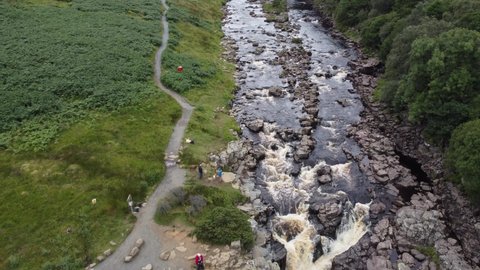 High Force , waterfall Lake District Cumbria UK Aerial pull back reveal footage 4K Summer 2021