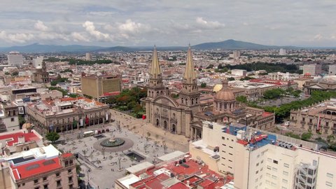 Aerial View Of Guadalajara Cathedral And Plaza Guadalajara In Jalisco, Mexico. - orbit left