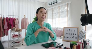 Asia woman micro influencer record live viral video camera at home studio. Happy youtuber fun talk speak advice review hobby in media. Vlogger selfie shoot enjoy work show smile teach like and share.
