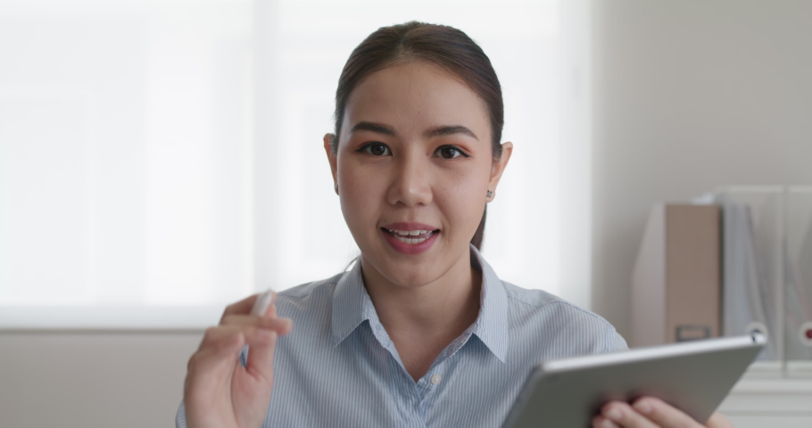 Asia people woman vlog trader tutor look at laptop screen live teach on video camera media talk show and share advice in stock data learn online class. Happy sale office remote work consult plan job.