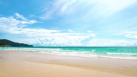4K Landscape view Sea and sand summer beach space area background.Blue sea waves and sky on sand famous beach.Scenic view beach after Covid-19.
