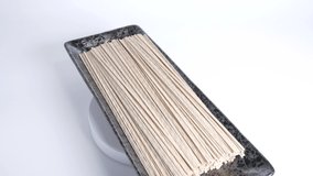 Dried Soba buckwheat noodles, close up video clip