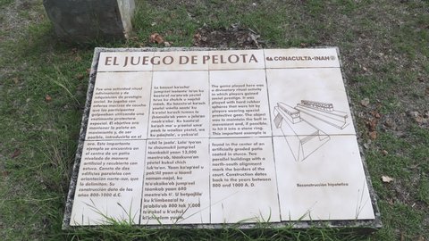UXMAL, YUCATAN, MEXICO - MAY 2021: Information board next to the"Pok-ta-pok" sport arena in ancient Mayan city of Uxmal, Yucatan