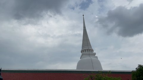 Chedi Wat Makut Kasatiyaram, Ratchaworawihan, Bangkok, Thailand, looking up at the blue sky Beautiful temple tourism concept in Thailand.