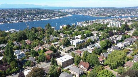 Cinematic 4K aerial drone footage of Lake Union, Eastlake, Queen Anne, Gas Works Park, Fremont, Union Bay near downtown Seattle, Washington