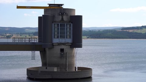 Naussac Lake - Naussac Dam Intake Tower With Tranquil Waters Near Langogne In Lozere, France. - static shhot