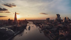 Dreamy Sunset, rare sky, Establishing Aerial View Shot of London UK, Tower Bridge, United Kingdom, revealing shot