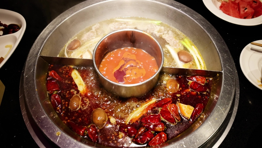 Chinese spicy hot pot cuisine | Shutterstock HD Video #1079720576