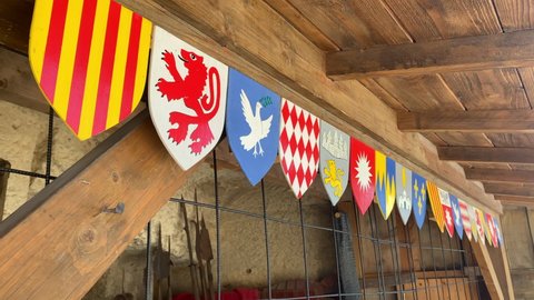 Les Baux-de-Provence, France - August 2021 : collection of coats of arms at the entrance to the armory of the Chateau of Les Baux de Provence