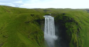 Skogafoss waterfall on Iceland - aerial drone video of Icelandic landscape