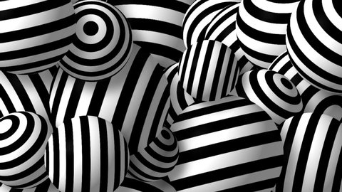 Black and white rotating striped balls loopable motion background