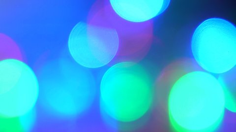 Abstract colorful bright red, blue, yellow, green, pink changing colors 4k video bokeh background