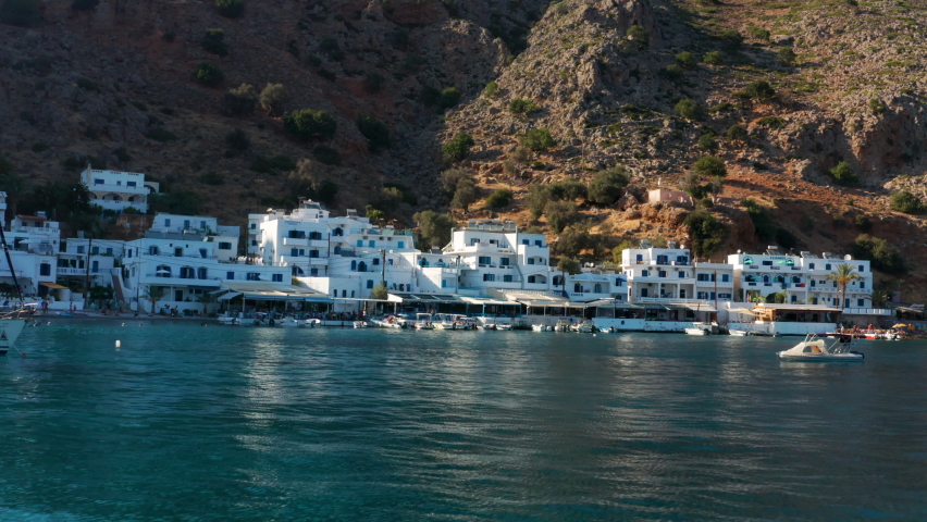 The Isolated Idyllic Port Village Of Loutro In The Sfakia Region Of Southern Crete, Greece - aerial drone shot