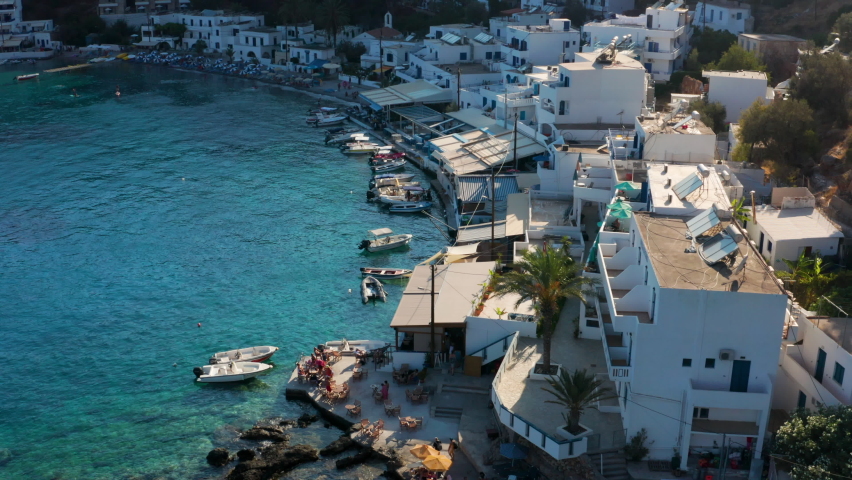 Beautiful White Architecture And Pristine Waters In Loutro In The Island Of Crete, Greece - aerial shot