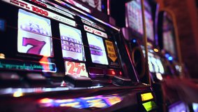 Caucasian Woman in Her 40s Playing Classic Slot Machine Game Inside One of the Las Vegas Casino. Gambling Industry Theme. - Powered by Shutterstock - Get 15% off with code: PIKWIZARD15