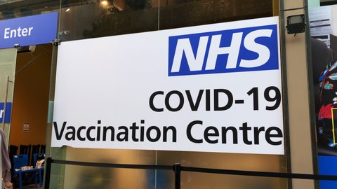 London, England, September 26th 2021: The NHS Covid-19 vaccination centre entrance at Stratford Shopping Centre, East London. Concept for vaccinating, protection, walk-in service and health.