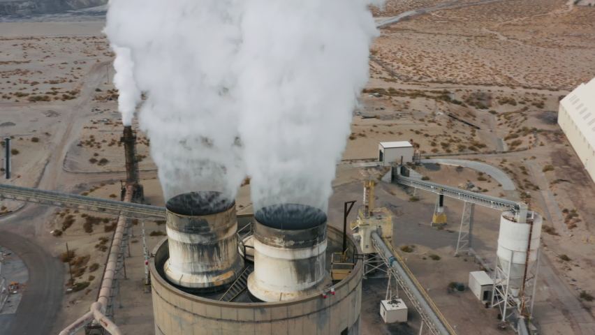 Factory pipe polluting air, environmental problems 4K aerial climate change, atmosphere gas, ozone layer USA ecology. Industrial factory pollution, smokestack exhaust gases. Industry zone, thick smoke