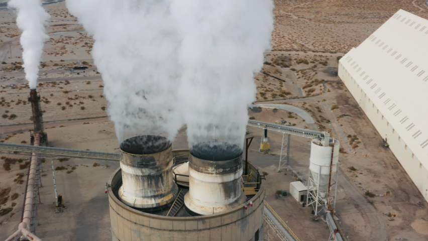 Factory pipe polluting air, environmental problems 4K aerial climate change, atmosphere gas, ozone layer USA ecology. Industrial factory pollution, smokestack exhaust gases. Industry zone, thick smoke