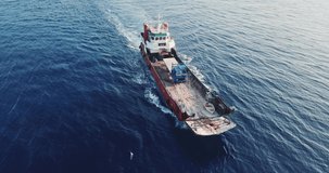 Aerial view of barge transporting single truck. High quality 4k footage