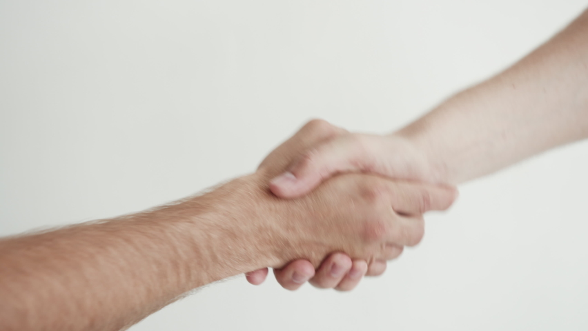 Hand Shake Two Friendly Partners Close-up Shot. Concept of Connection Colleagues People. Friends Man Agree of Opportunity Startup. Hands Holding Part of Human Body. Development Modern Ambition Worker
