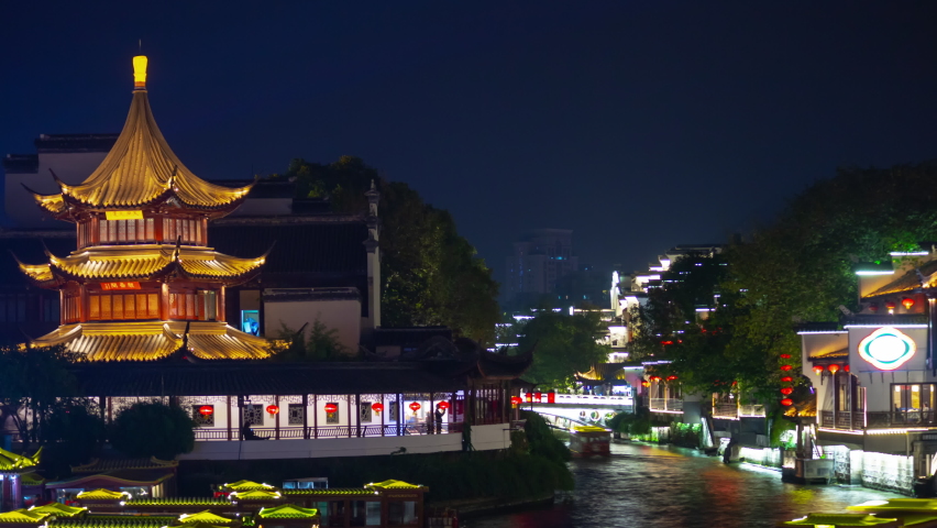 night illuminated famous nanjing city old town riverside traffic pagoda panorama timelapse 4k china