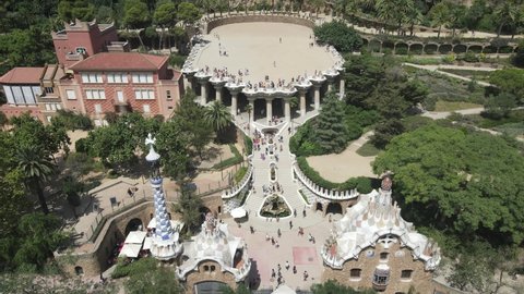 Aerial view of Park Guell in Barcelona, by Gaudi, on summer day in Barcelona, Spain. Drone of Guell Park, famous and extremely popular travel destination in Europe.