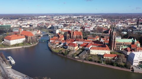 Aerial view of island of Ostrow Tumski in Wroclaw with Cathedral of St. John the Baptist on sunny spring day 