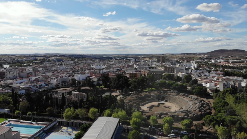 DRONE AERIAL FOOTAGE: The Archaeological Ensemble of Mérida, located in Extremadura, Spain. The Roman Theatre and the Amphitheatre were built between 16th and 15th b.C. when he was consul Agrippa. Royalty-Free Stock Footage #1079811194