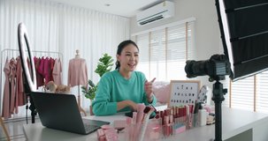 Asia woman micro influencer record live viral video camera at home studio. Happy youtuber fun talk speak advice review hobby in media. Vlogger selfie shoot enjoy work show smile teach like and share.