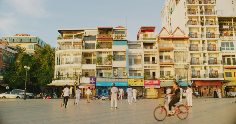 Local People Exercise with morning light along the Tonle Sap River. Red Helium camera-8k resolution-vintage Zeiss lenses in Phnom Penh, Cambodia.